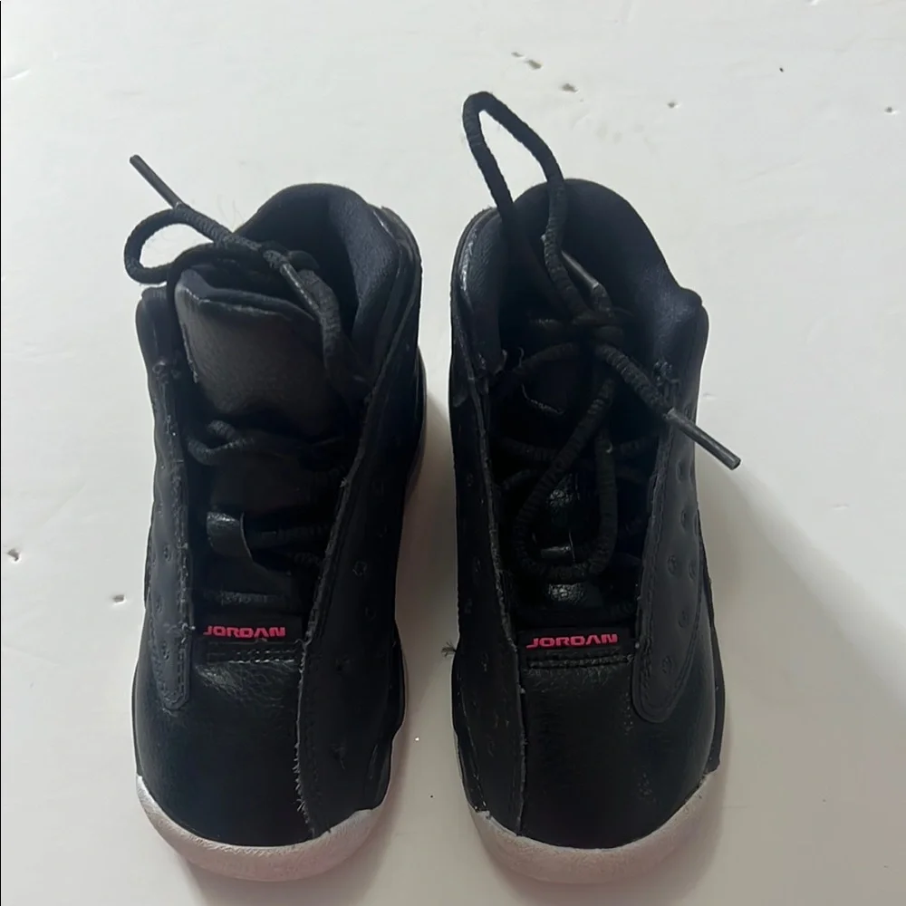 AirJordan 11 Retro low td Black Sneakers with pink and‎ White Soles kids size 8C
